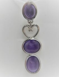 Rhodium plated 925 sterling silver pendant with 3 natural Amethyst Approx size  40mm x 11.3mm Matching earrings available