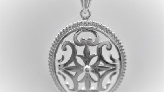 Rhodium plated 925 sterling silver oval pendant Approx size  37mm x 23mm