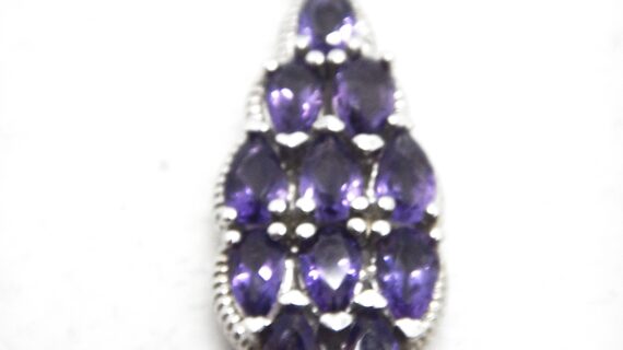 Rhodium plated 925 sterling silver pendant with natural Amethyst Approx size  39mm x 12mm Matching ring & earring available