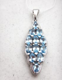 Rhodium plated 925 sterling silver pendant set with natural Swiss Blue topaz 38.75 X 12 MM