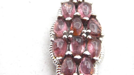 Rhodium plated 925 sterling silver pendant with natural Swiss blue topaz Approx size  39mm x 12mm Matching ring & earrings available