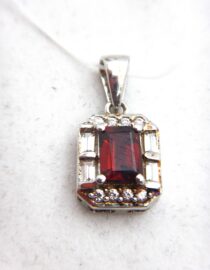 Rhodium plated 925 sterling silver pendant with natural Garnet & white topaz Approx size  12.2mm x 10mm Matching ring & earrings available