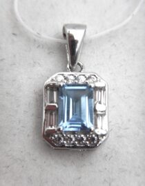 Rhodium plated 925 sterling silver pendant with natural Swiss blue topaz & white topaz Approx size  12.2mm x 10mm Matching ring & earrings available