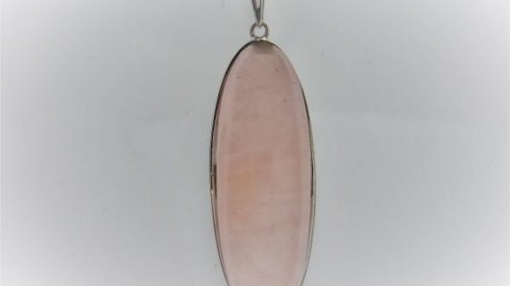 Rhodium plated 925 sterling silver pendant with natural Rode quartz Approx size   35mm x 14mm