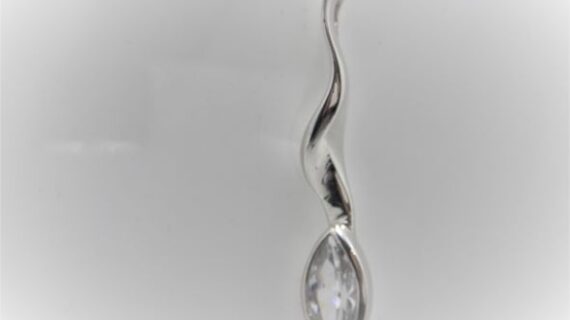 Rhodium plated 925 sterling silver pendant pendant set with one cubic zirconia  Approx size  46mm x 9mm