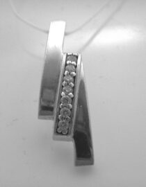 Rhodium plated 925 sterling silver pendant with white cubic zirconia Approx size  22.5mm x 7mm