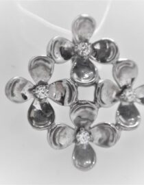 Rhodium plated 925 sterling silver pendant set with white cubic zirconia Approx size  18mm x 18mm Matching earrings available