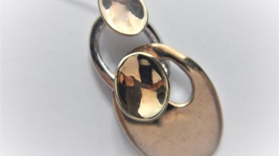 Rhodium & gold plated pendant Approx size  28mm x 13.5mm