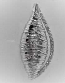 Rhodium plated 925 sterling silver shell shaped pendant with white cubic zirconia Approx size  42.5mm x 19mm Matching earrings available
