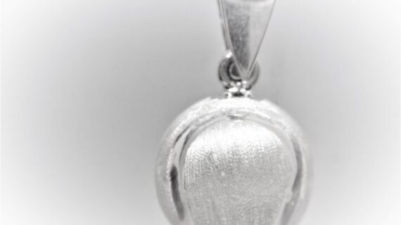 925 Sterling silver harmony ball with tennis ball pttern Approx size  21mm diam