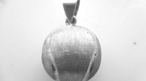 925 Sterling silver harmony ball with tennis ball pttern Approx size  21mm diam