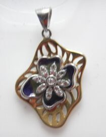 Rhodium & gold plated 925 sterling silver pendant with blue enamel set with white cubic zirconia Approx size  23mm x 17mm Matching earrings available