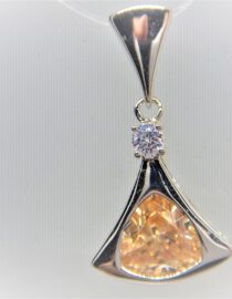 Rhodium plated 925 sterling silver pendant set with white & champagne CZ  25 X 14 MM