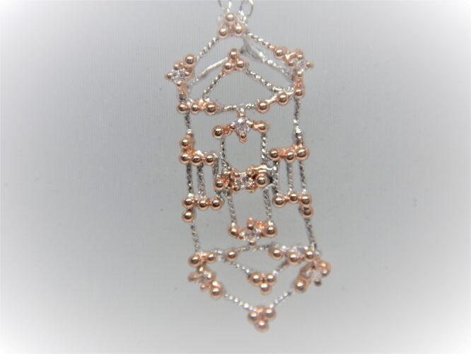 Rhodium plated handmade 925 sterling silver pendant with gold plating set with CZ