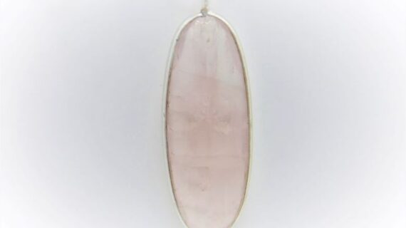 Rhodium plated 925 sterling silver pendant with natural Rose quartz Approx size  35mm x 11mm