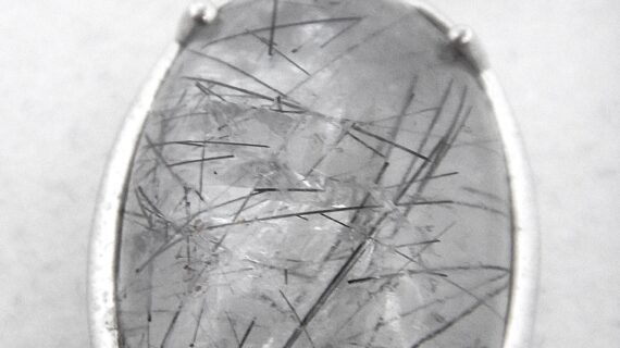 925 Sterling silver pendant with natural Rutile quartz Approx size  35mm x 16.5mm