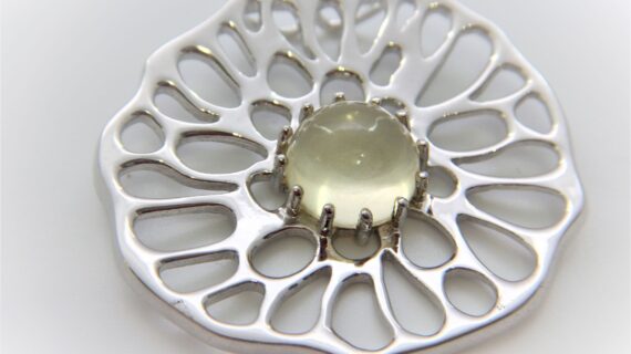 Rhodium plated 925 sterling silver pendant set with natural Lemon quartz  approx 35.5 MM DIAM
