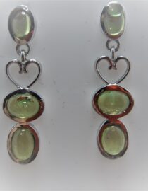 Rhodium plated 925 sterling silver earrings set with natural Peridot Approx size  31.00 Matching pendant available
