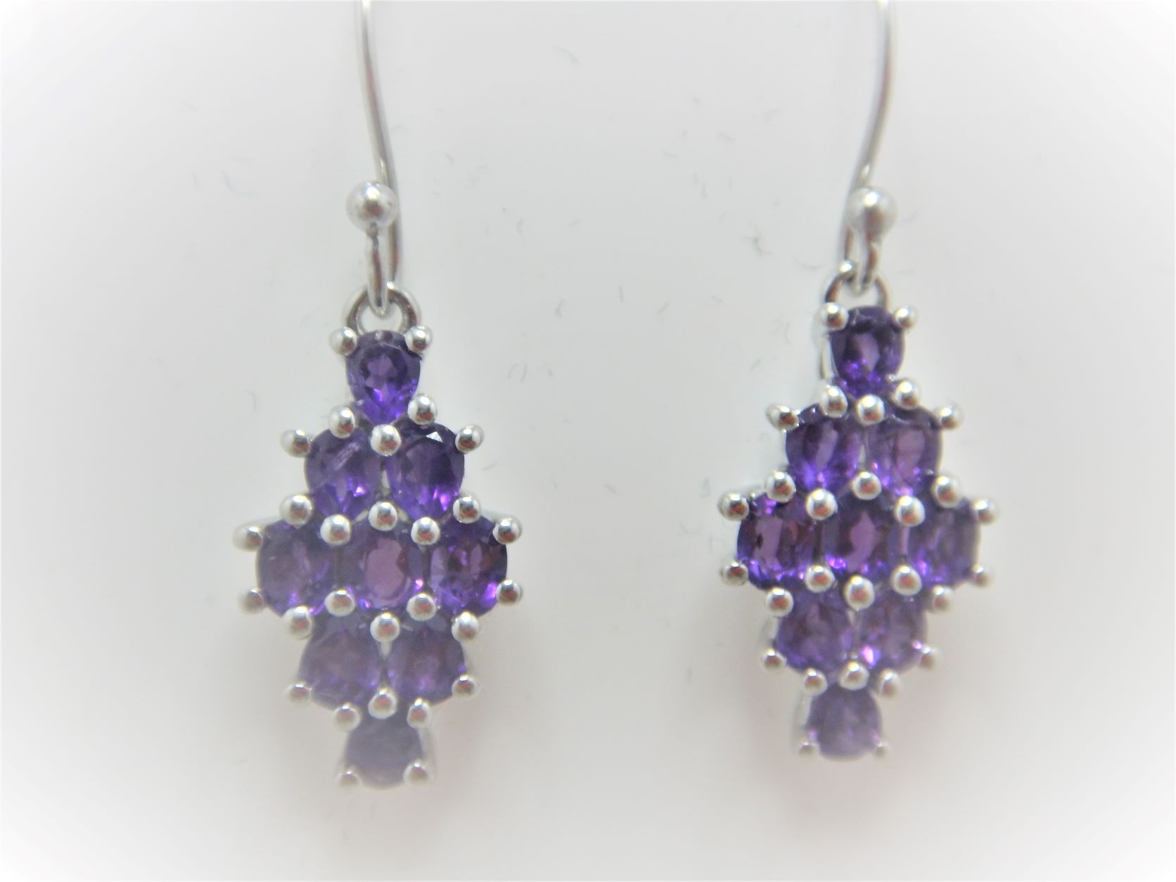 Rhodium plated 925 sterling silver earrings set with natural Amethyst  22.6 X 11.25MM