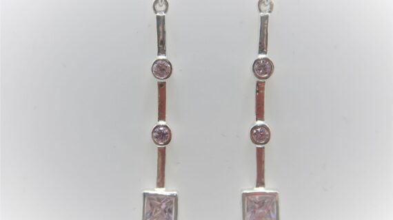 Rhodium plated 925 sterling silver earrings set with Pink CUBIC ZIRCONIA Approx size 52mm long