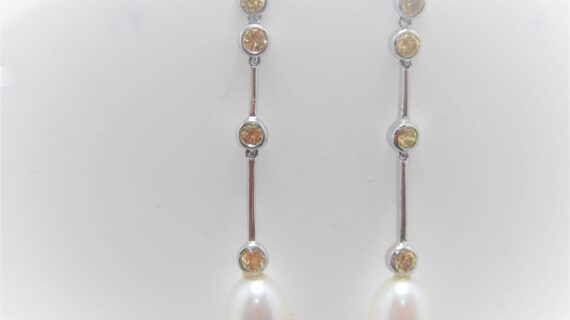 Rhodium plated 925 sterling silver stud earrings set with synthetic lemon quartz & natural freshwater pearls Approx size 43mm long