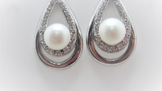 Rhodium plated 925 sterling silver earrings set with cubic zirconia & natural freshwater pearls Approx size  27mm x 17.5mm