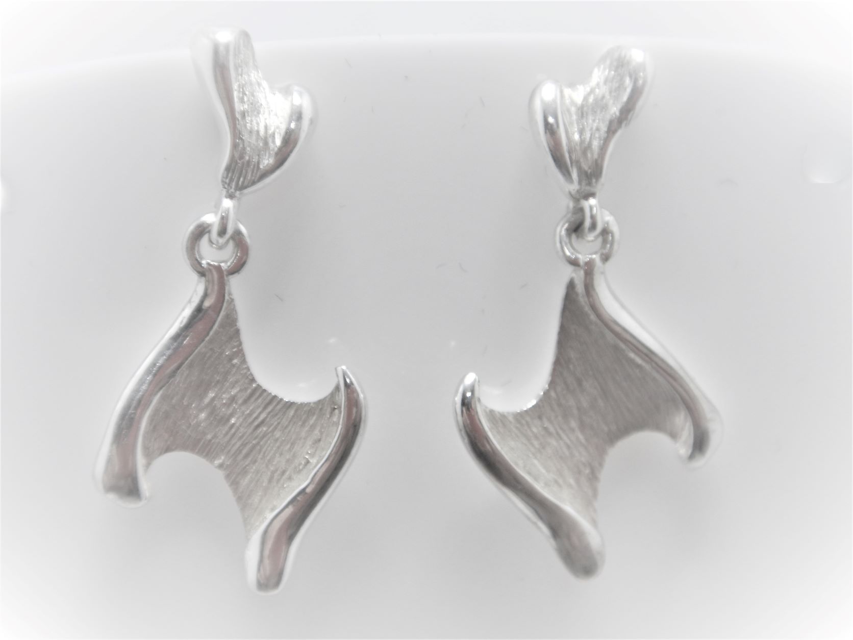 Rhodium plated 925 sterling silver earrings with scratch & polish finish  30 MM X 17 MM