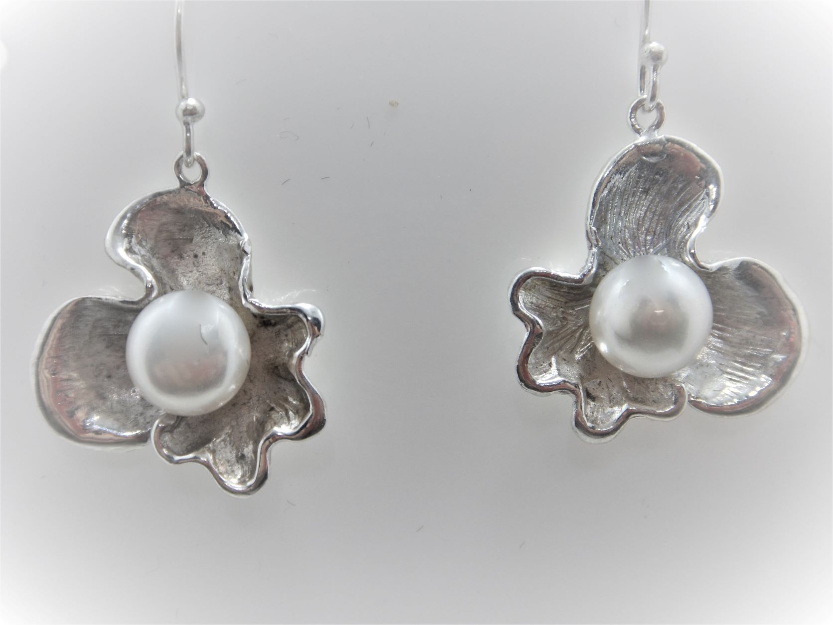 Rhodium plated 925 sterling silver earrings with mat & polish finish set with natural freshwater pearl  27.3 X 24.20 MM