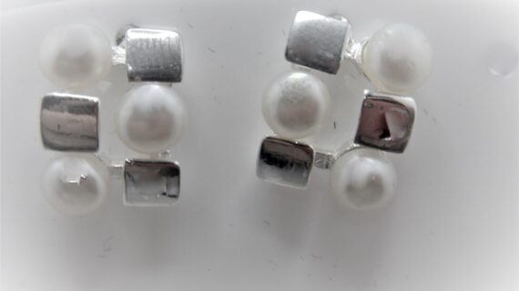 Rhodium plated 925 sterling silver stud earrings set with natural freshwater pearls  17.65 X 13.4 MM