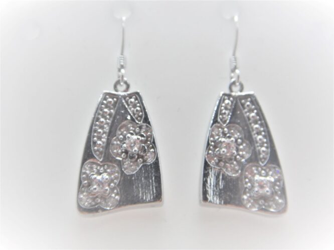 Rhodium plated 925 sterling silver earrings with scratch finish set with white cubic zirconia Approx size  19mm x 13.5mm Matching pendant & ring available