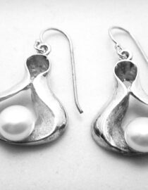 Rhodium plated 925 sterling silver earrings set with freshwater pearls  28 X  22.3  MM