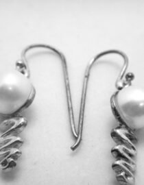 Rhodium plated 925 sterling silver earrings set with freshwater pearls  24.5 X 7.9 MM