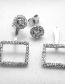 Rhodium plated 925 sterling silver earrings set with white cubic zirconia Approx size  24mm long