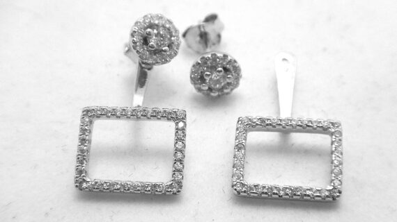 Rhodium plated 925 sterling silver earrings set with white cubic zirconia Approx size  24mm long