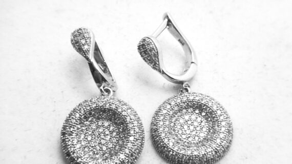 Rhodium plated 925 sterling silver earring with pave set cubic zirconia Approx size  32mm long Matching pendant available