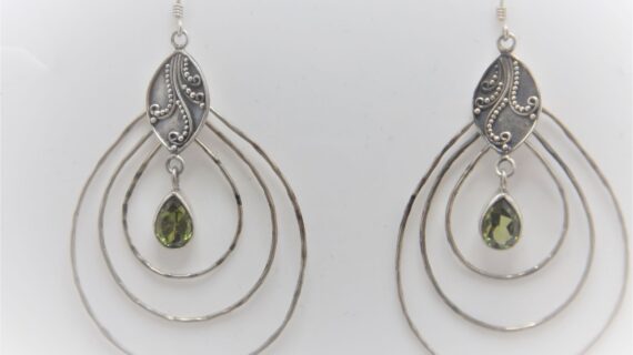 925 Sterling silver teardrop earrings set with synthetic Peridot Approx size 68mm long
