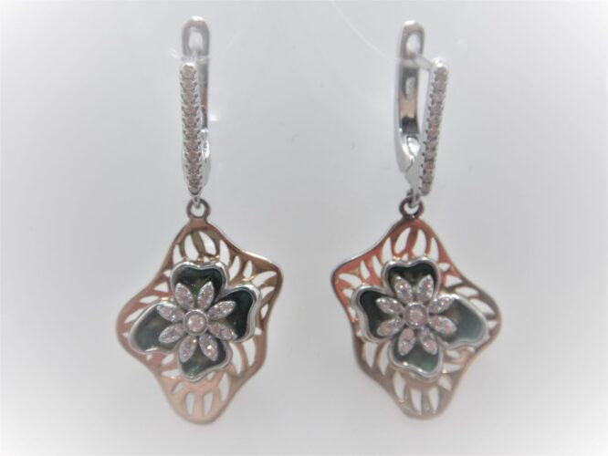 Rhodium & gold plated 925 sterling silver earrings set with white  cubic zirconia & blue enamel Approx size  39mm long Matching pendant available