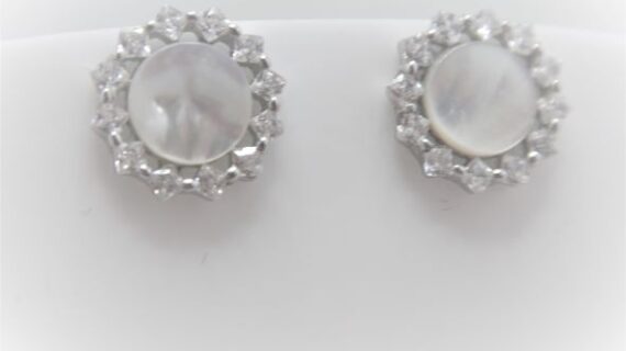 Rhodium plated 925 sterling silver stud earrings set with natural Mother of pearl & white cubic zirconia Approx size  12mm diam Matching pendant available