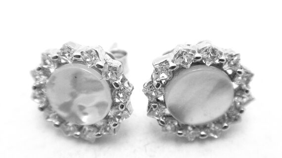Rhodium plated 925 sterling silver stud earrings set with natural Mother of pearl & white cubic zirconia Approx size  12mm diam Matching pendant available