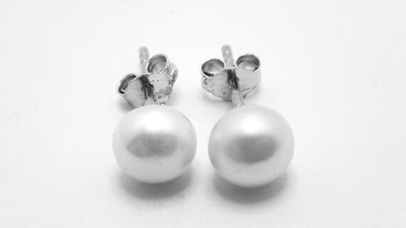 925 Sterling silver studs with natural freshwater pearls Approx size  6.5mm diam