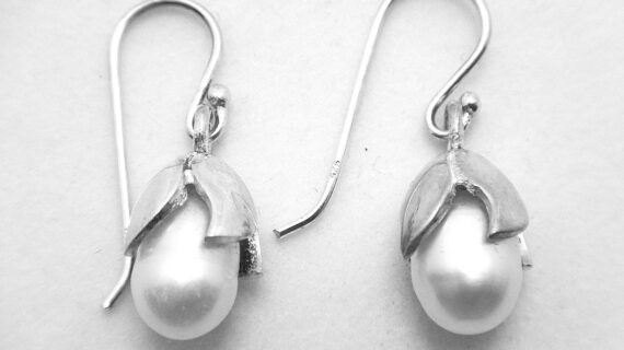Rhodium plated 925 sterling silver earrings set with natural freshwater pearls