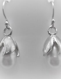 Rhodium plated 925 sterling silver earrings set with natural freshwater pearls
