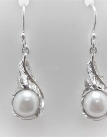 925 Sterling silver earrings set with natural freshwater pearls  Approx size  32mm long Matching pendant available