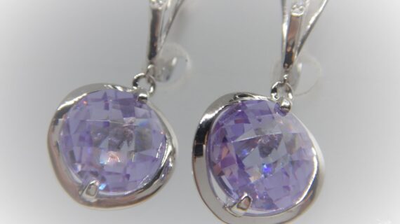 Rhodium plated 925 sterling silver earrings set with purple CZ  33 MM X 15 MM DIAM