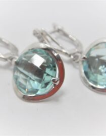 Rhodium plated 925 sterling silver earrings set with white & aqua coloured cubic zirconia  Approx size  32.5mm long x 15mm diam Matching pendant available