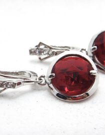 Rhodium plated 925 sterling silver earrings set with white & Red cubic zirconia Approx size 32.5mm long x 15mm diam