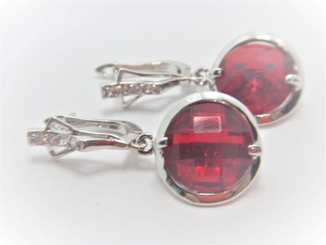 Rhodium plated 925 sterling silver earrings set with white & Red cubic zirconia Approx size 32.5mm long x 15mm diam