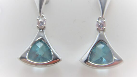 Rhodium plated 925 sterling silver triangular earrings set with white & blue cubic zirconia Approx size 24mm long Matching pendant available