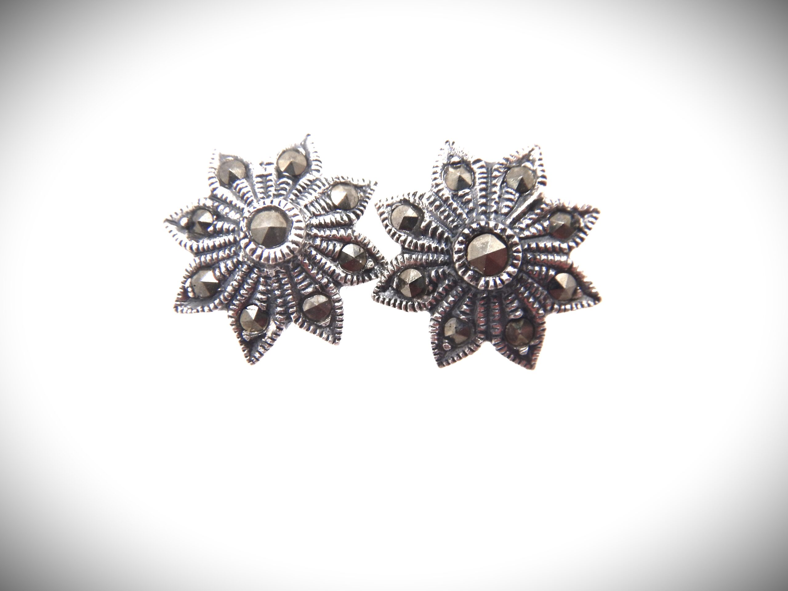 925 Sterling silver stud earrings set with Marcasite Approx size 12mm diam