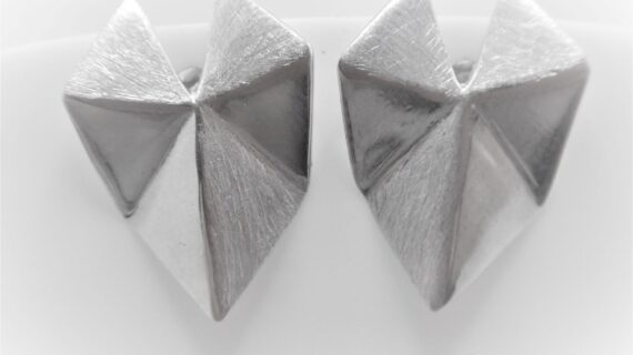 Rhodium plated 925 sterling silver stud earrings   23 MM X 15.5 MM